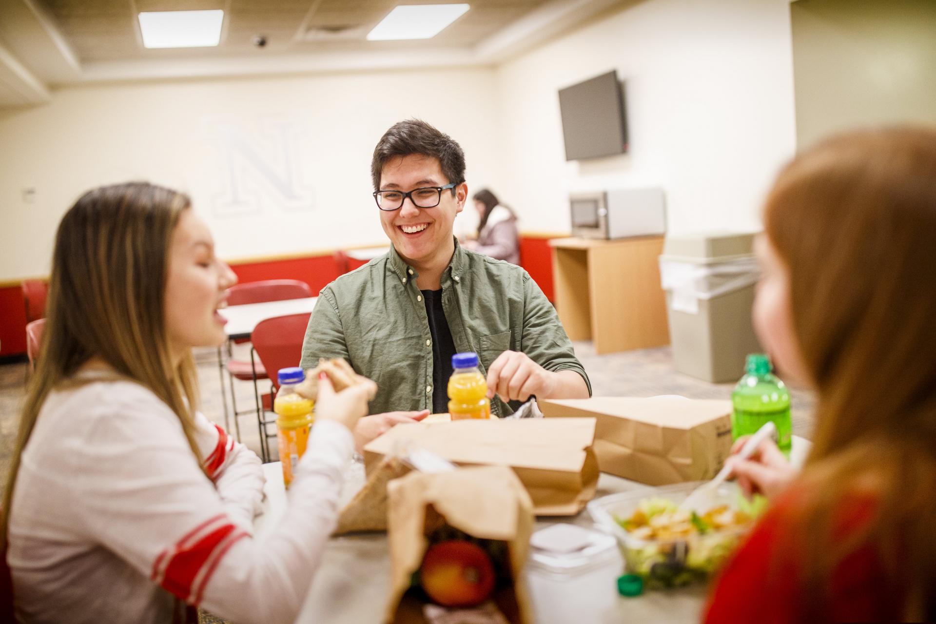 Students eat together in the basement of Selleck