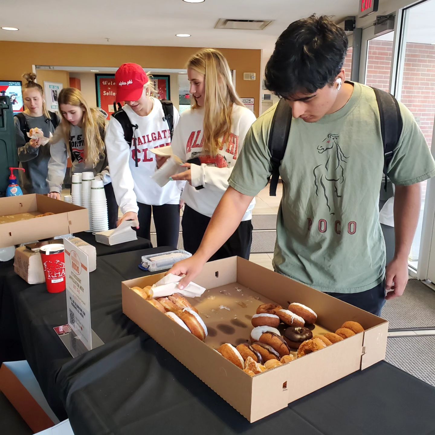 Residents enjoy free donuts and coffee during Resident Appreciation Week