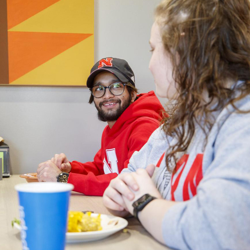 Student eating in the East Campus Dining Center
