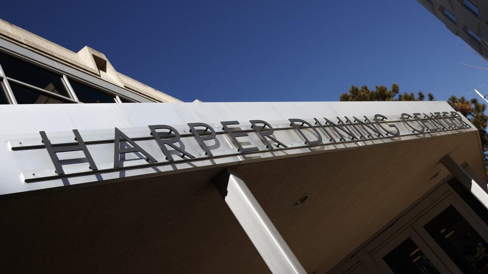 A picture of the sign outside of the Harper Dining Center