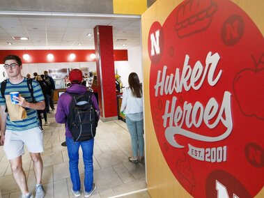 Students enter Husker Heroes in Willa Cather Dining Center to pick up their to-go sandwich.