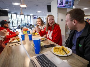 A group of students dining at East Union Dining Center.