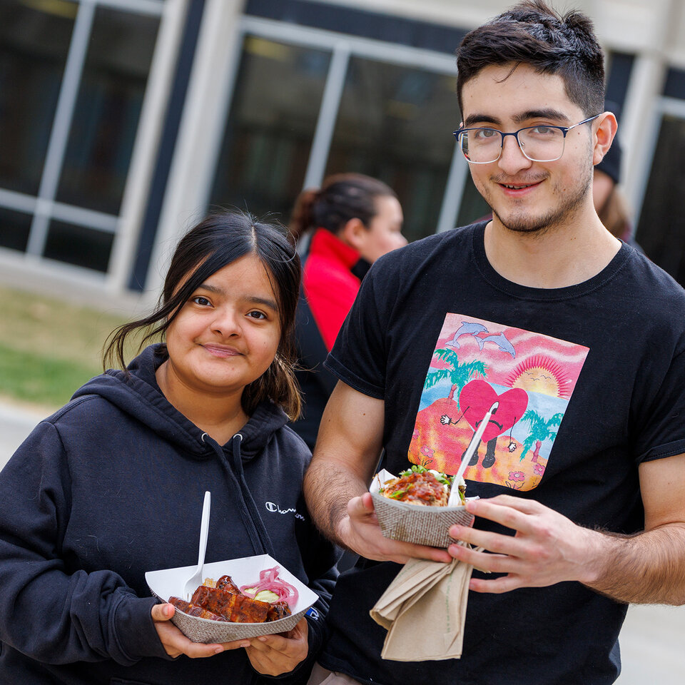 students enjoying the food truck test run