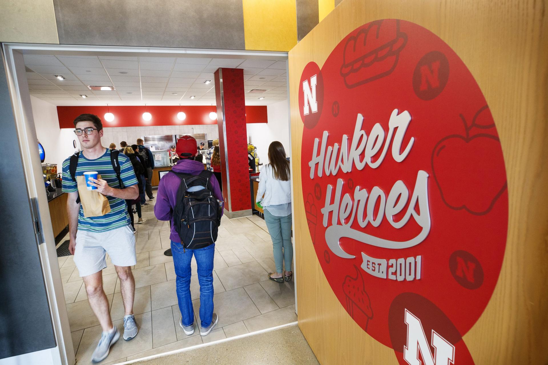 Students exit Husker Heroes at Cather